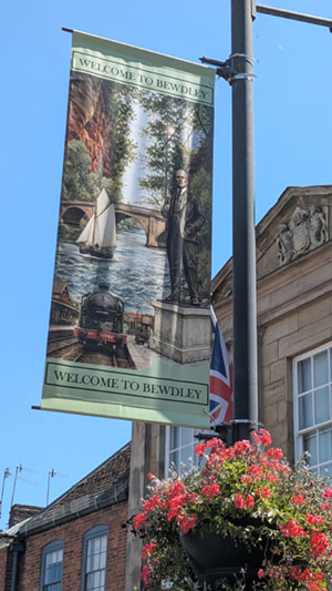 Banner hanging from a lampost welcoming visitors to Bewdley
